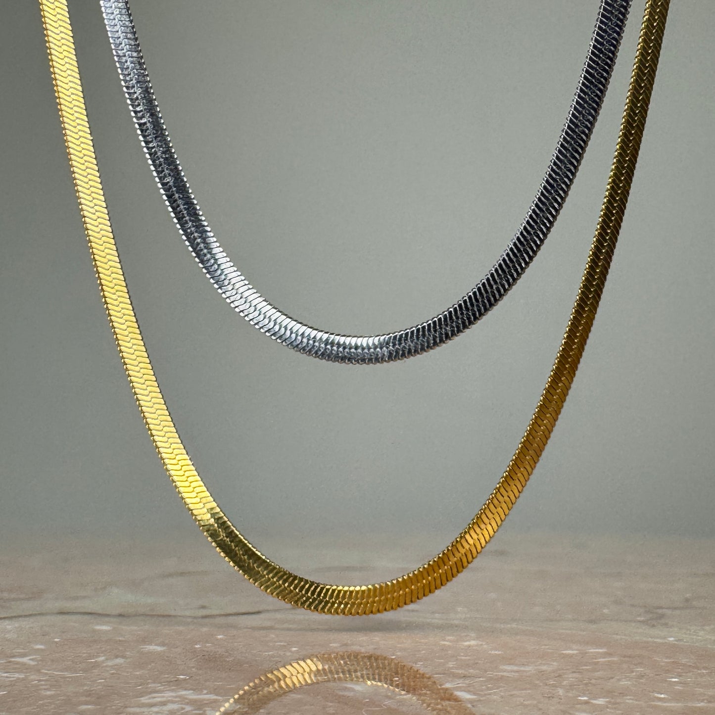 Herringbone chain necklace in silver and gold