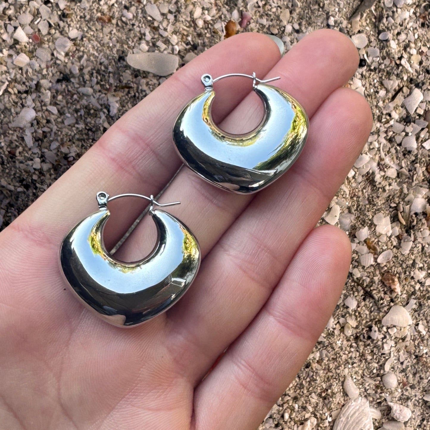 Silver Chunky Heart Hoop Earrings in Hand