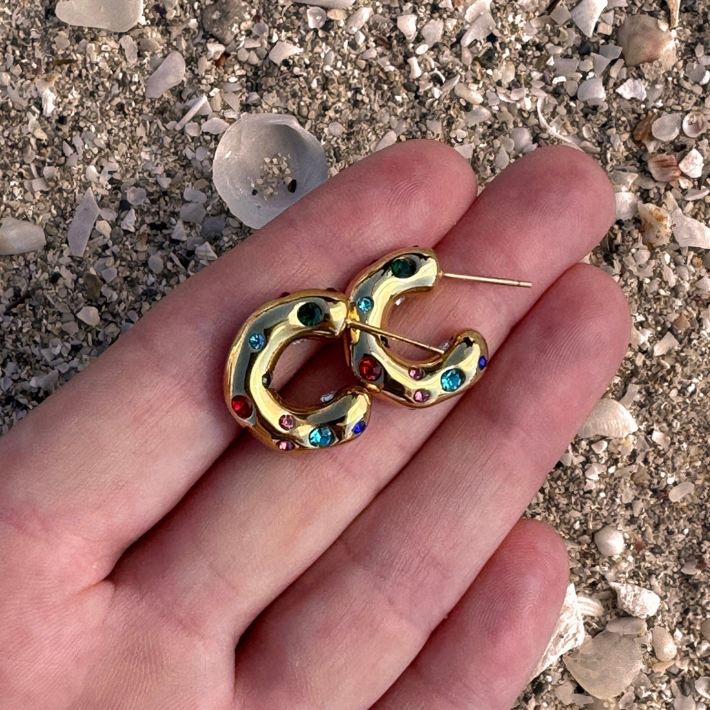 Colourful Zircon Gold Plated Molten C-Shape Earrings in hand