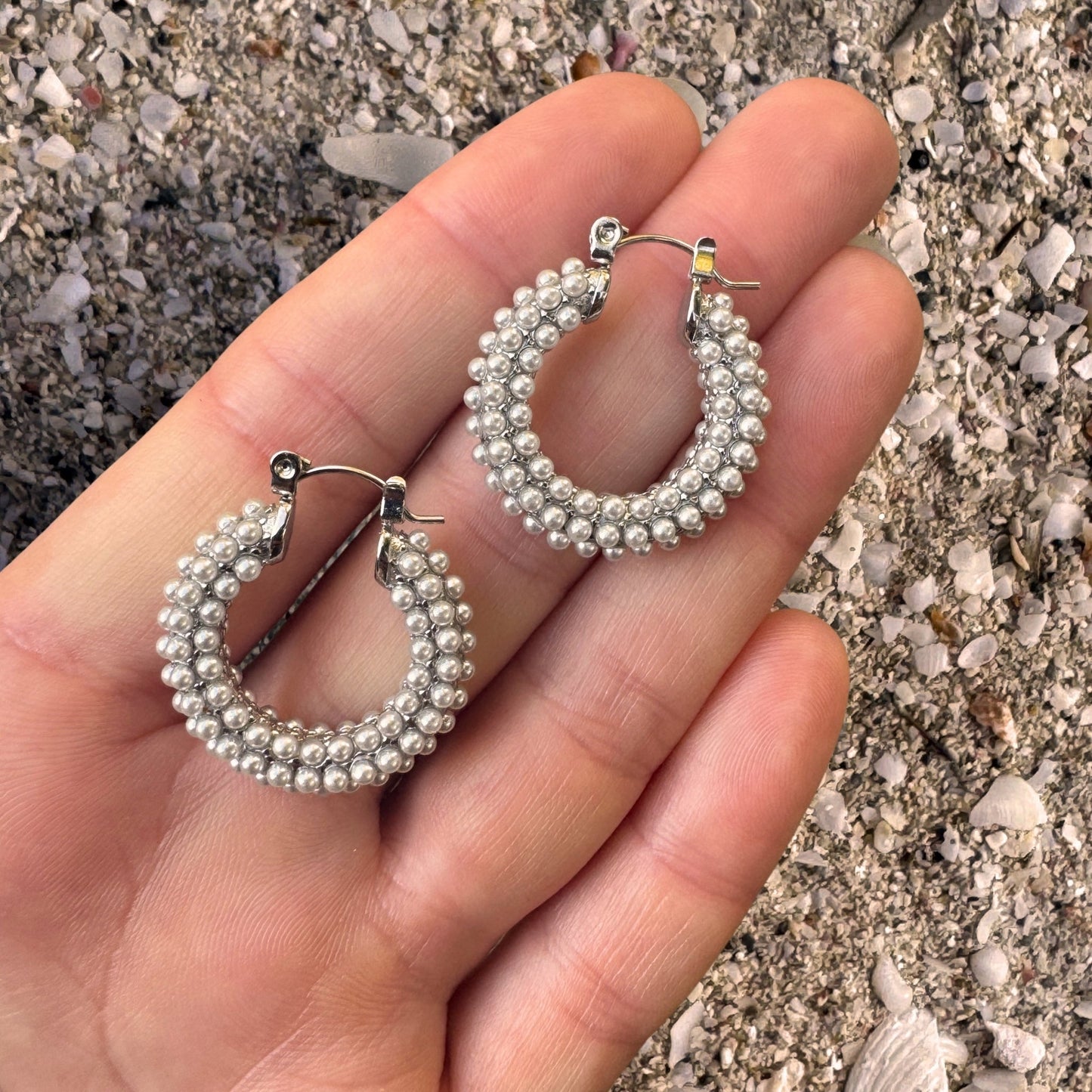 Silver Seed Pearl Hoop Earrings in hand