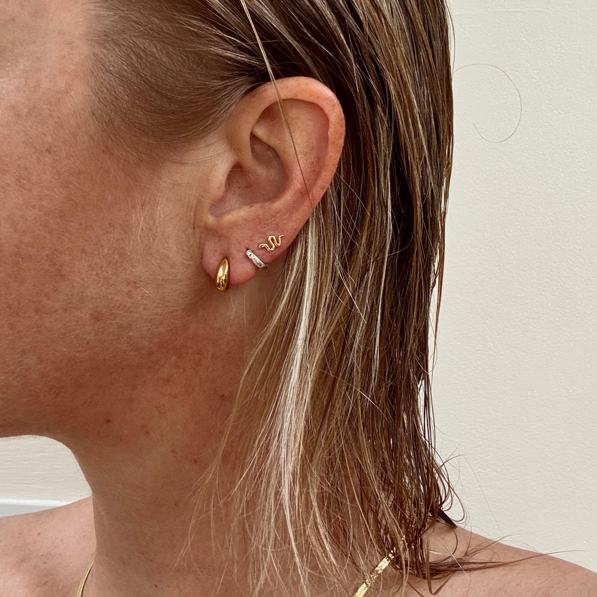 Gold Plated Tear Drop Studs from Jessica Rose Jewellery on ear