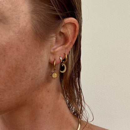 Gold plated sun and moon mismatched huggie hoop earrings from Jessica Rose jewellery