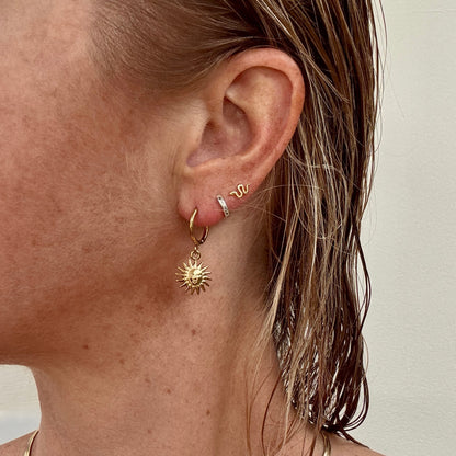 Gold plated sun face huggie hoop earrings from Jessica Rose jewellery
