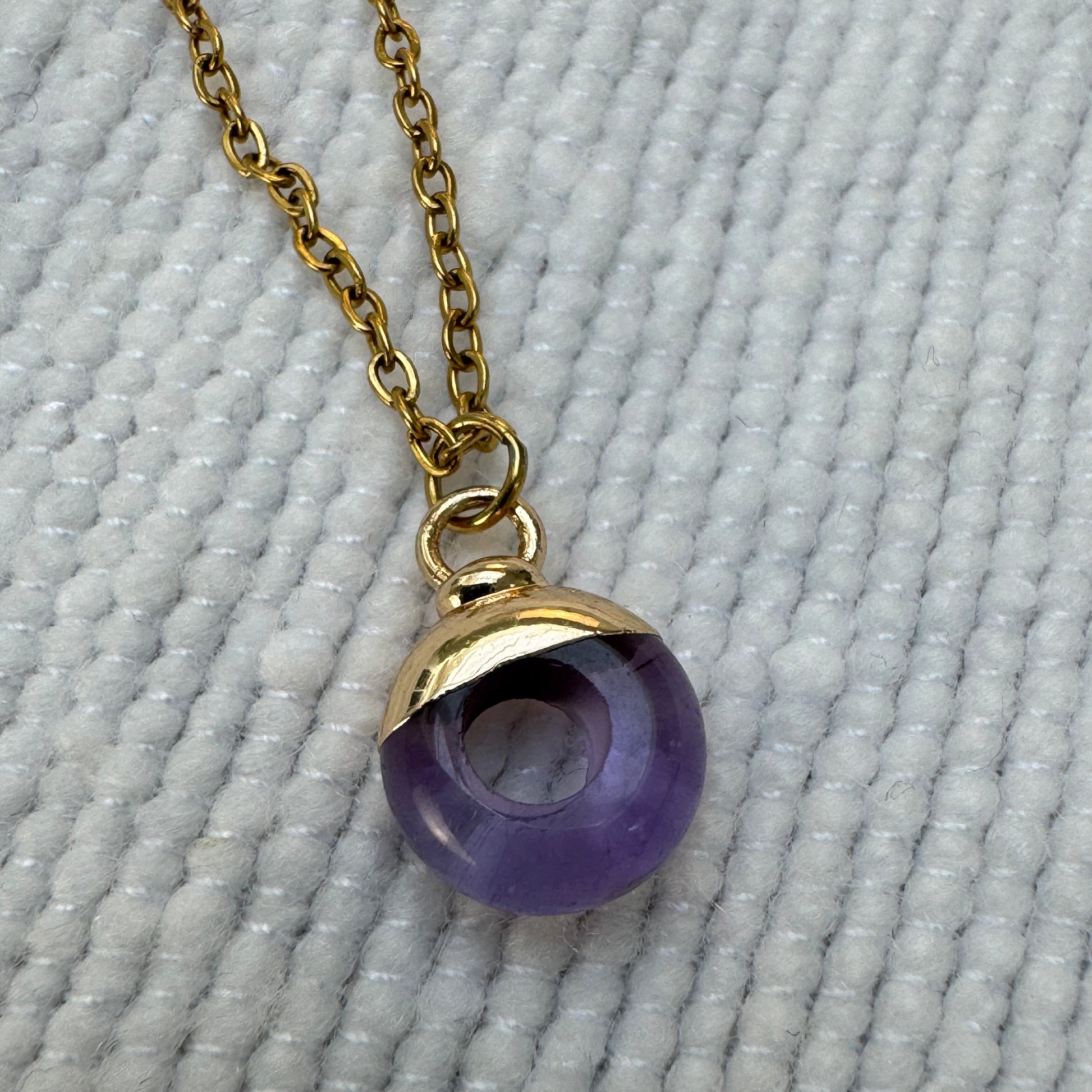 Purple Amethyst Crystal Ring Pendant from Jessica Rose