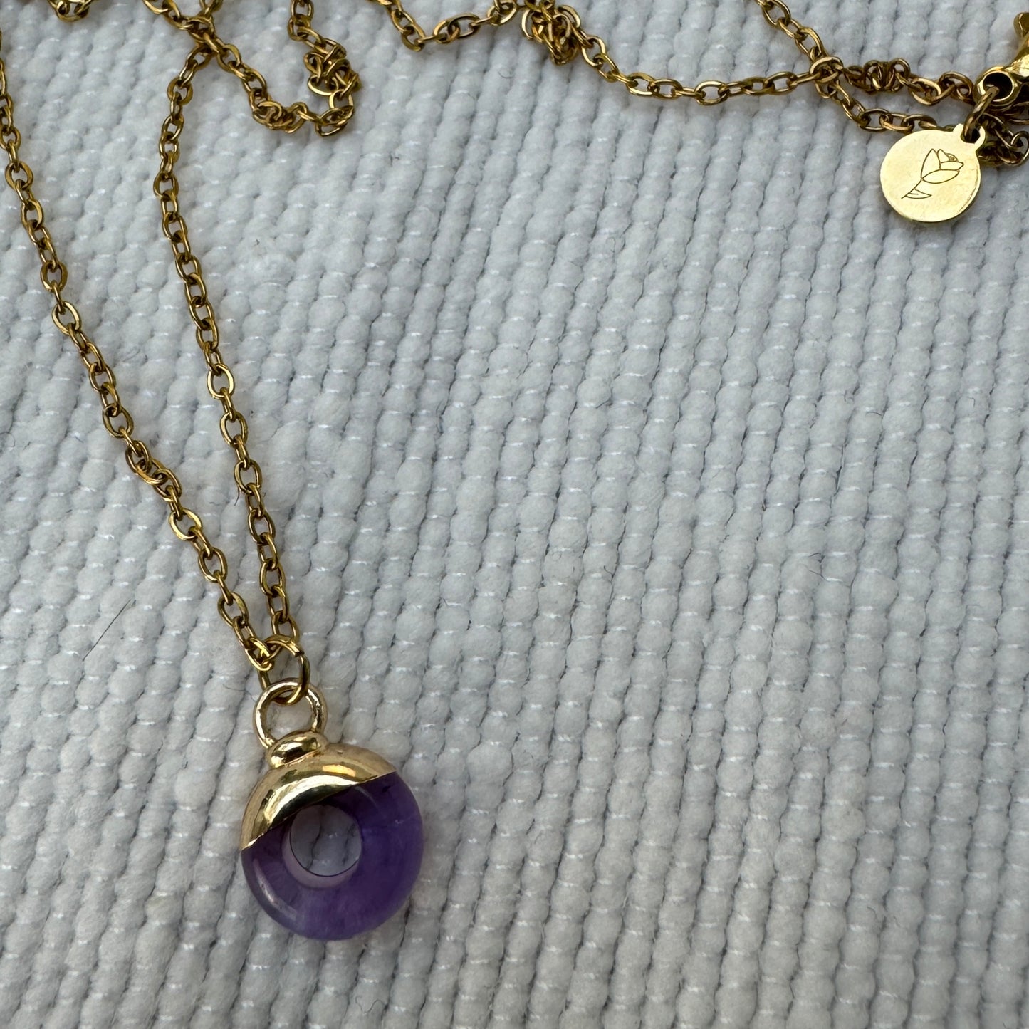 Purple Amethyst Crystal Ring Pendant from Jessica Rose