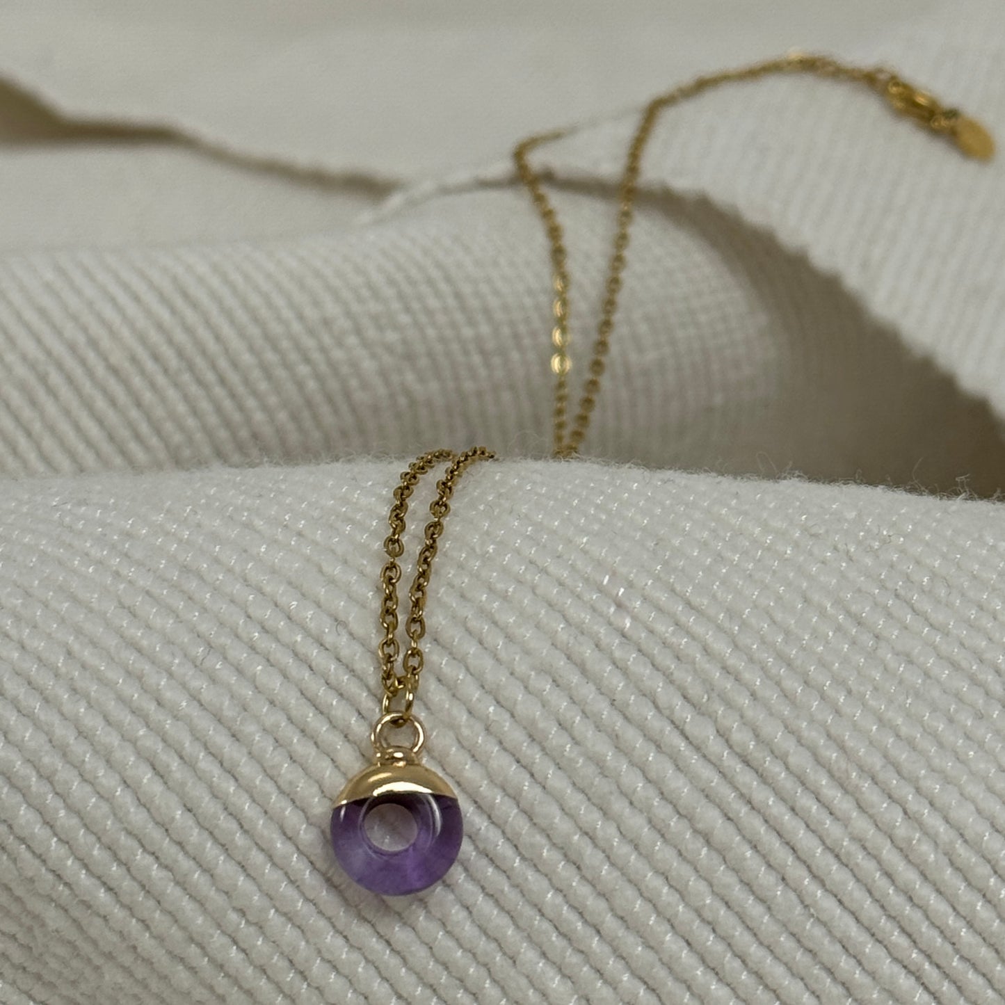 Purple Amethyst Crystal Ring Pendant from Jessica Rose