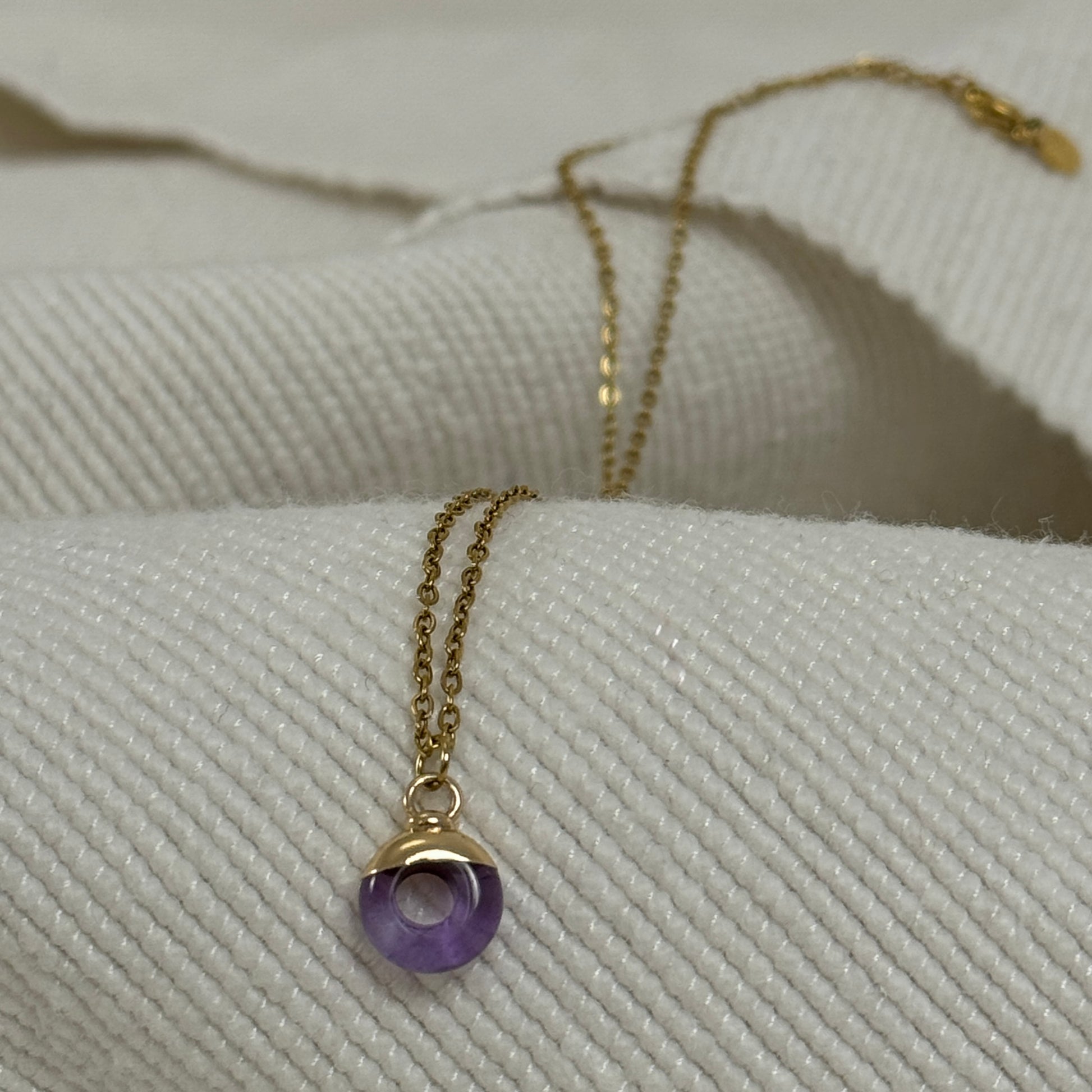 Purple Amethyst Crystal Ring Pendant from Jessica Rose