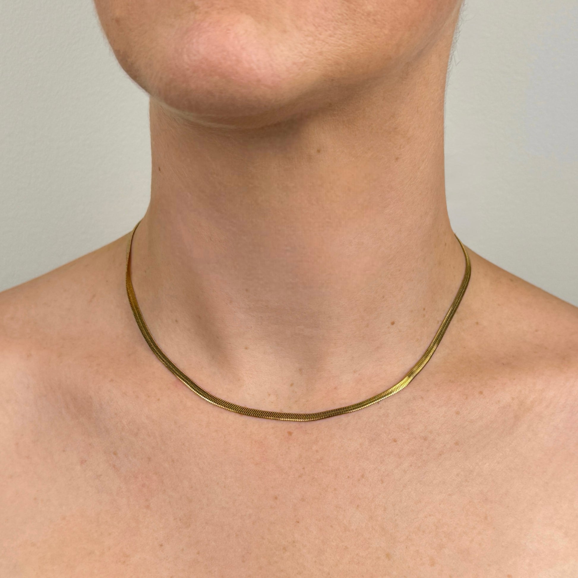 Herringbone chain necklace in gold